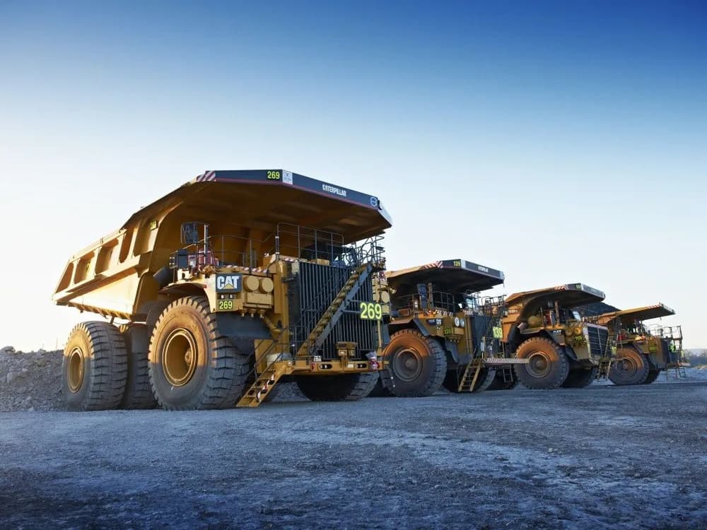 Haul trucks lined up at an Australian mine site